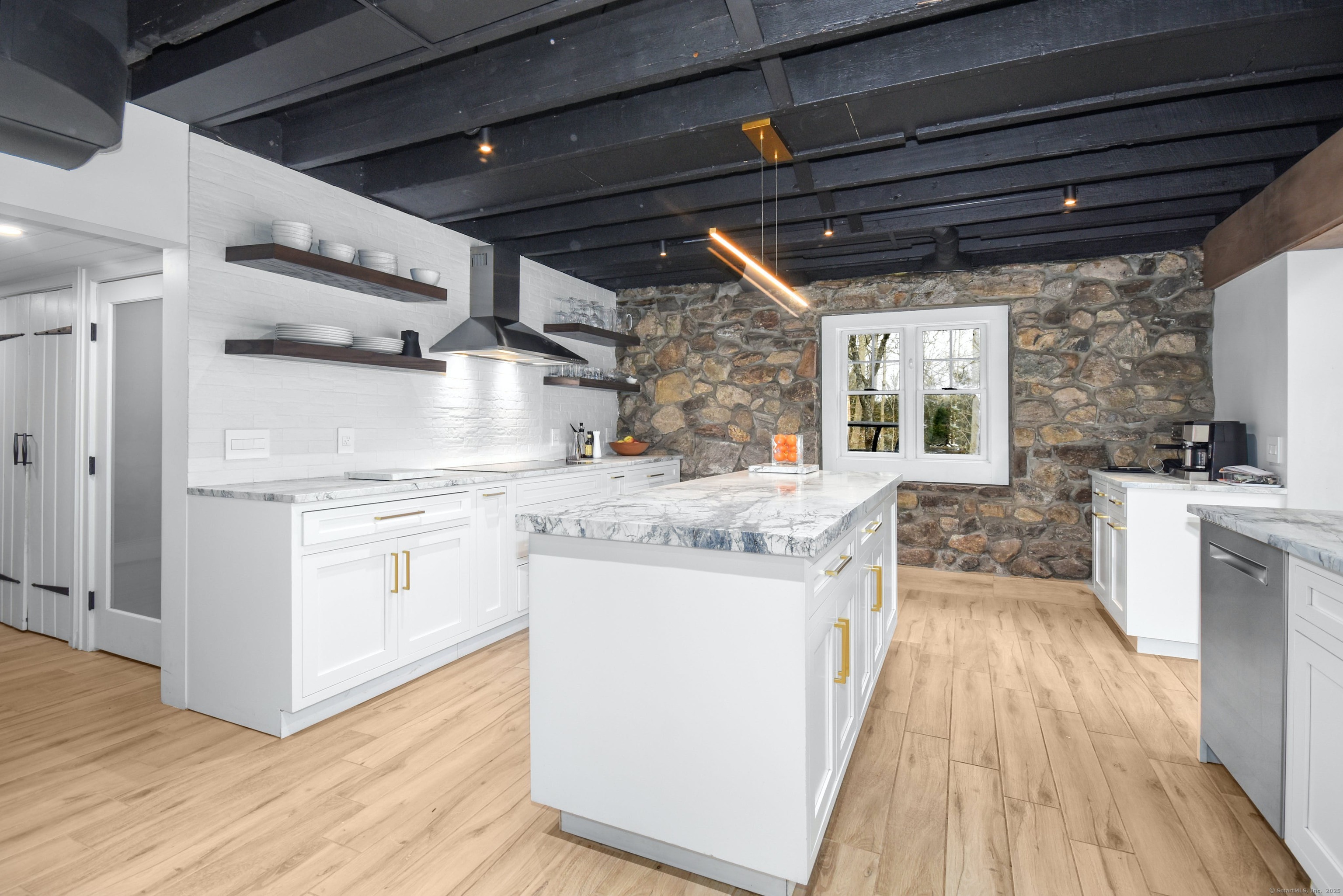 24 Cartbridge Road Weston, CT 06883 - Photo 10 of 27 The stone wall offers additional charm and drama. A pantry is an additional asset.