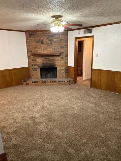6111 38th Street, Unit B Lubbock, TX 79407 - Photo 3 of 9 a view of an empty room with a fireplace