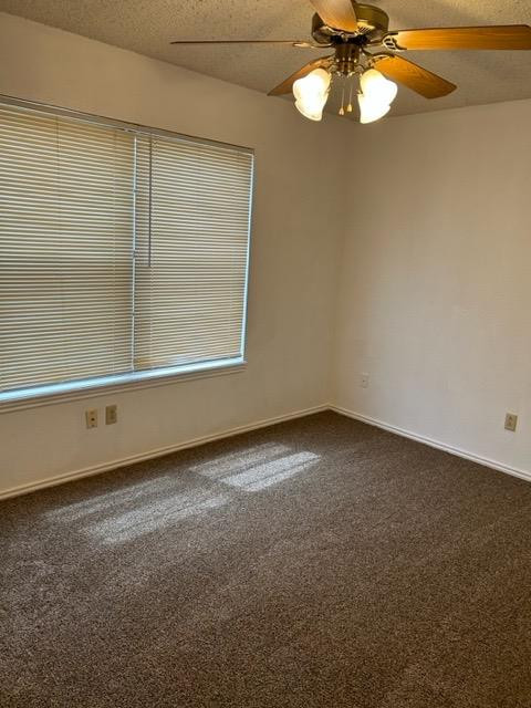 6111 38th Street, Unit B Lubbock, TX 79407 - Photo 5 of 9 a view of an empty room with a window
