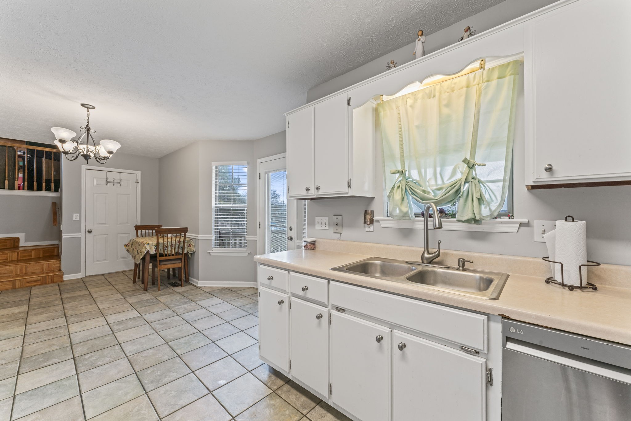 3591 April Lane Murfreesboro, TN 37130 - Photo 11 of 38 a kitchen with a sink and cabinets