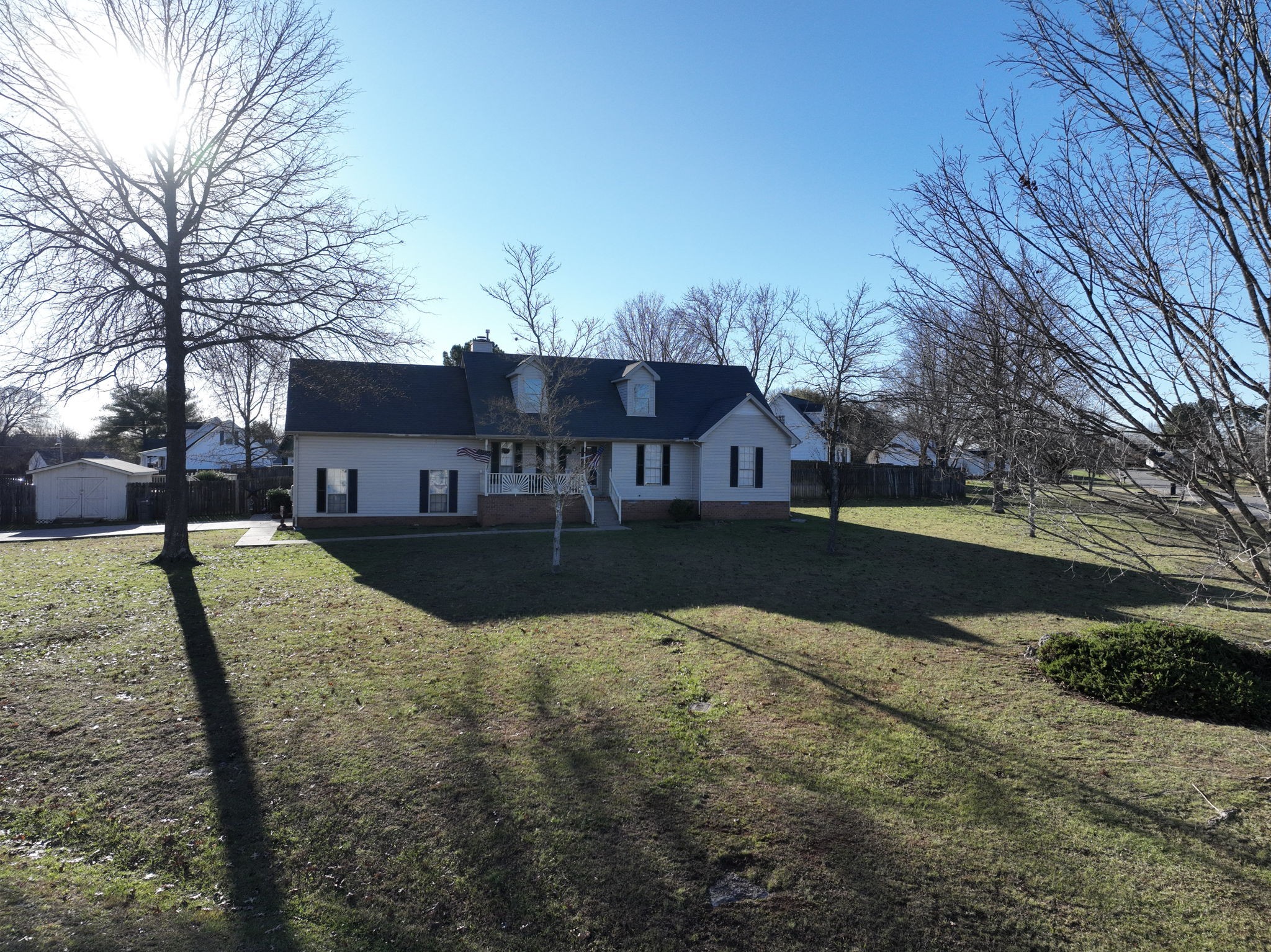 3591 April Lane Murfreesboro, TN 37130 - Photo 2 of 38 a view of swimming pool with outdoor seating and house in the background