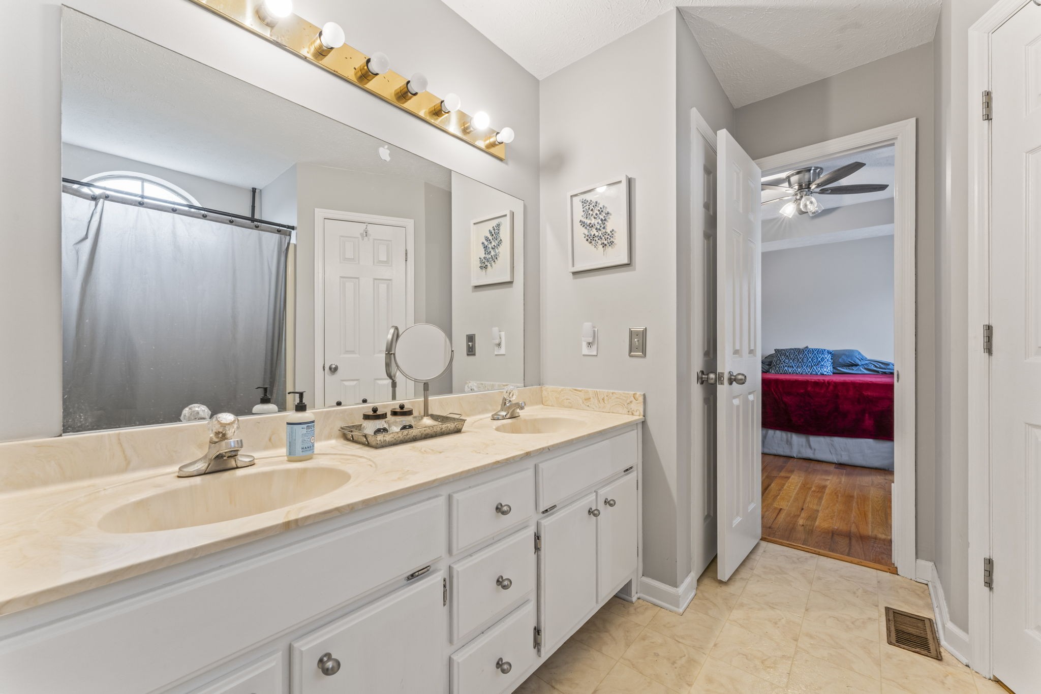 3591 April Lane Murfreesboro, TN 37130 - Photo 21 of 38 a en suite bathroom with double sink and a mirror