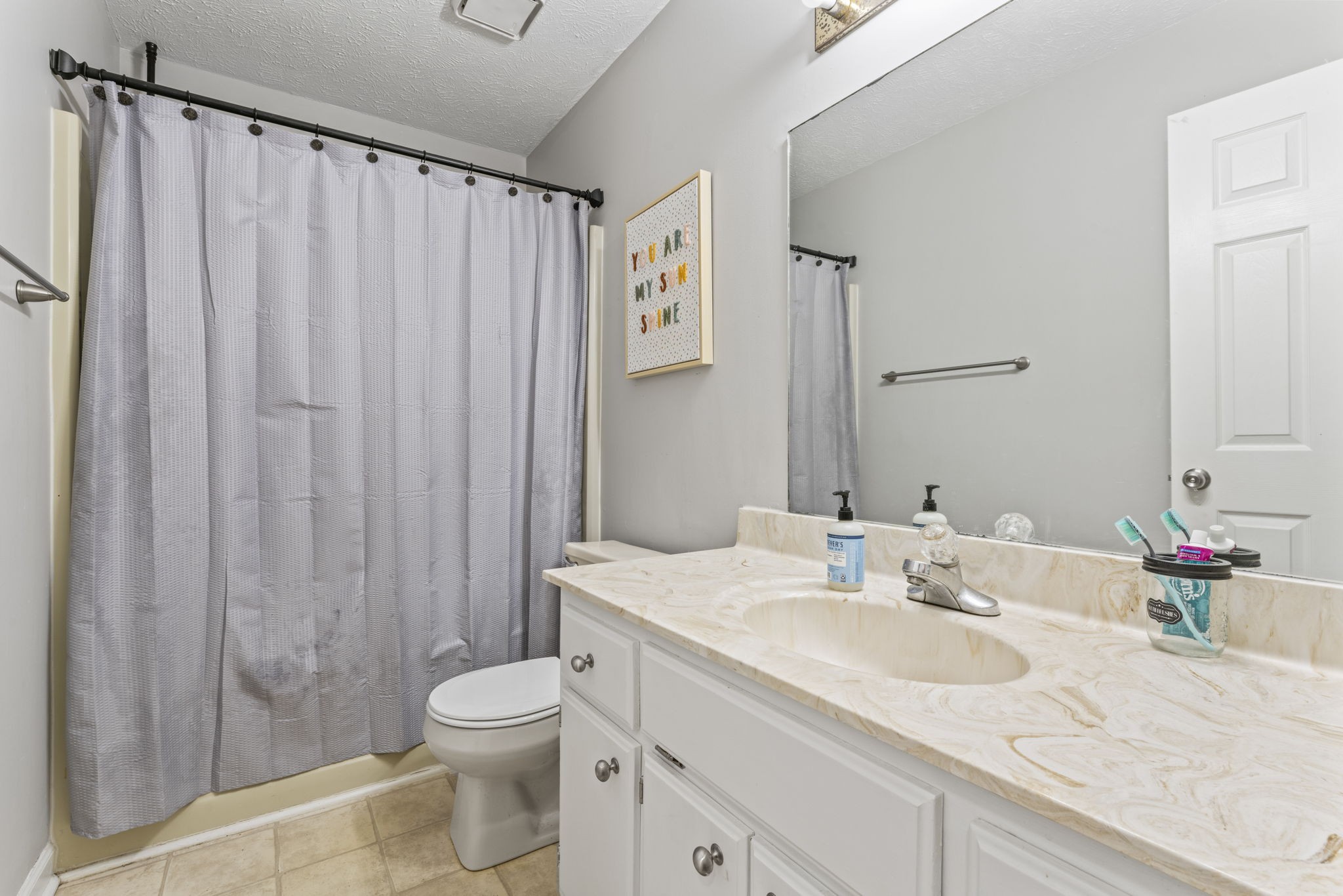 3591 April Lane Murfreesboro, TN 37130 - Photo 26 of 38 a bathroom with a granite countertop sink vanity mirror and toilet
