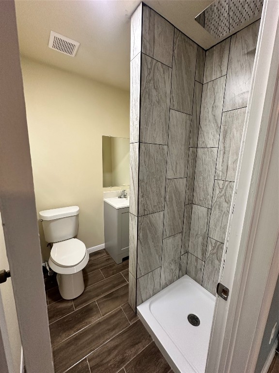 6911 Bauman Road Houston, TX 77022 - Photo 13 of 17 a bathroom with a sink toilet and shower