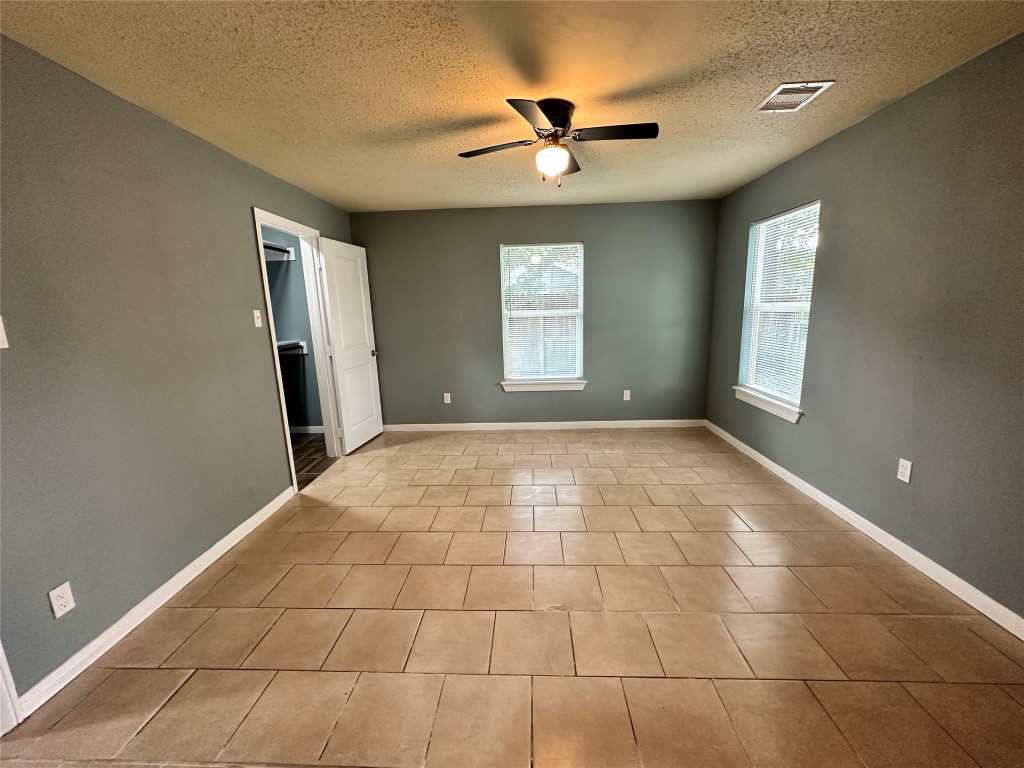 6911 Bauman Road Houston, TX 77022 - Photo 15 of 17 a view of an empty room with a window