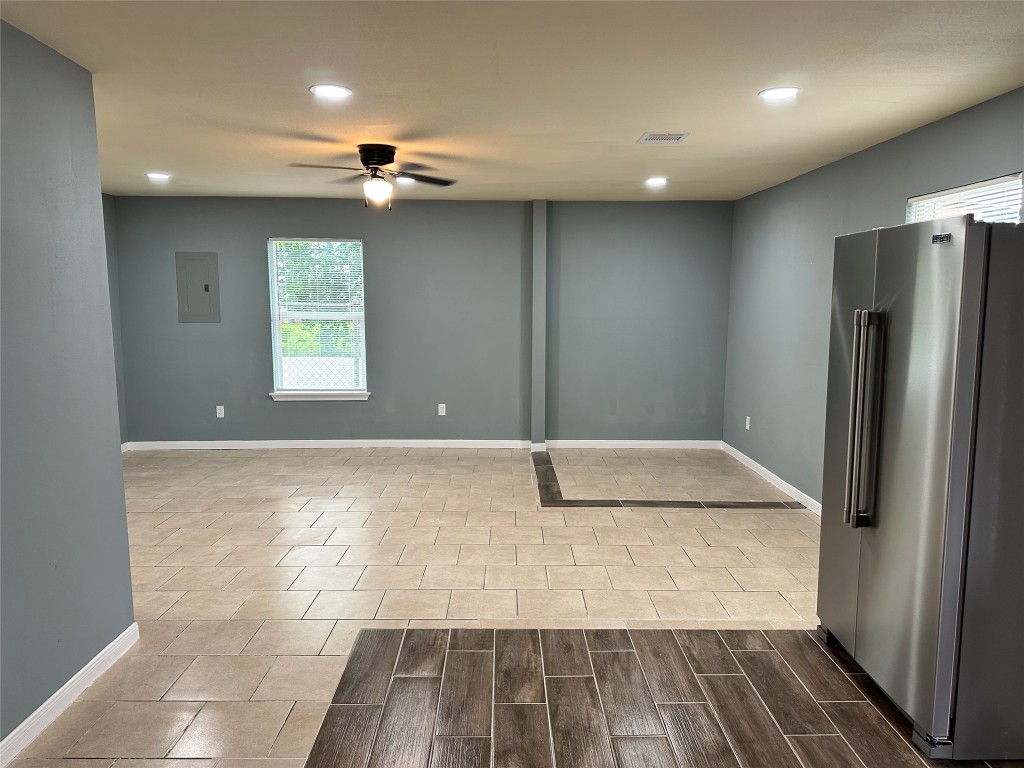 6911 Bauman Road Houston, TX 77022 - Photo 7 of 17 a view of an empty room with a window