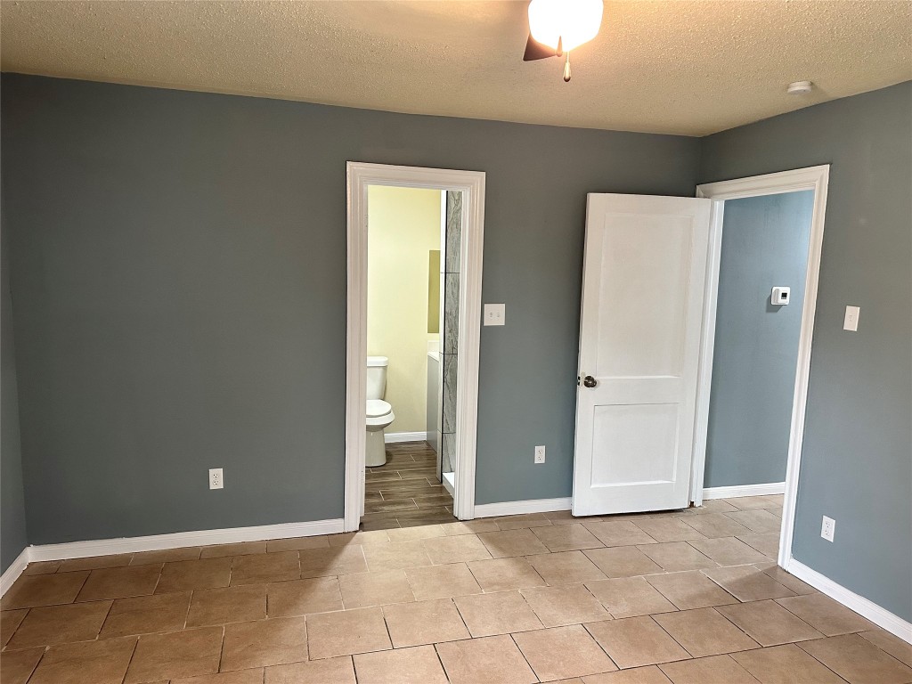 6911 Bauman Road Houston, TX 77022 - Photo 10 of 17 a view of an empty room with a bathroom