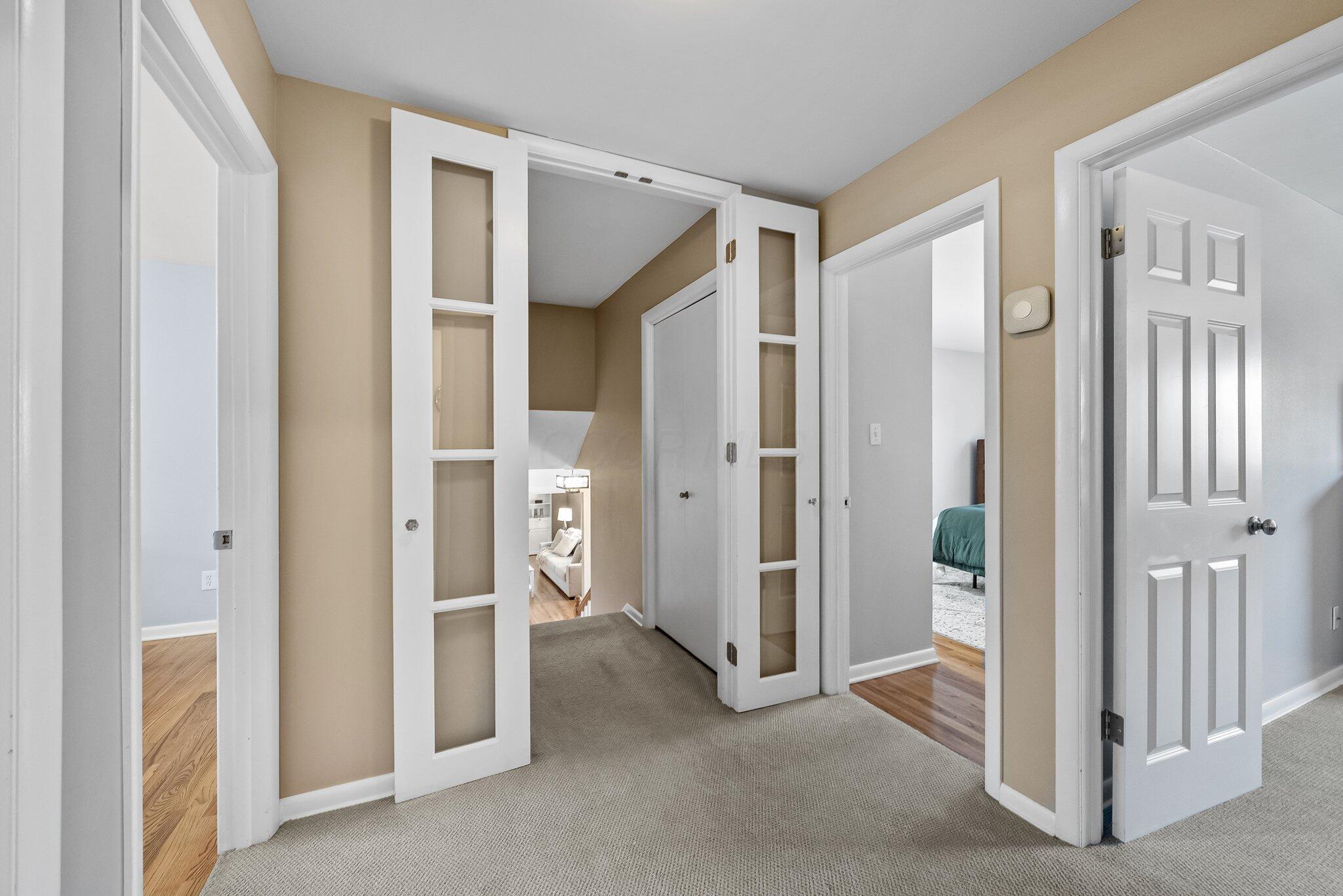 1269 Windham Road Columbus, OH 43220 - Photo 23 of 82 Doors add for extra privacy to the upstairs landing where you can access the four bedrooms and hall full bath. A linen closet can also be found here.