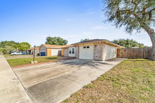 a bedroom with a bed and dresser