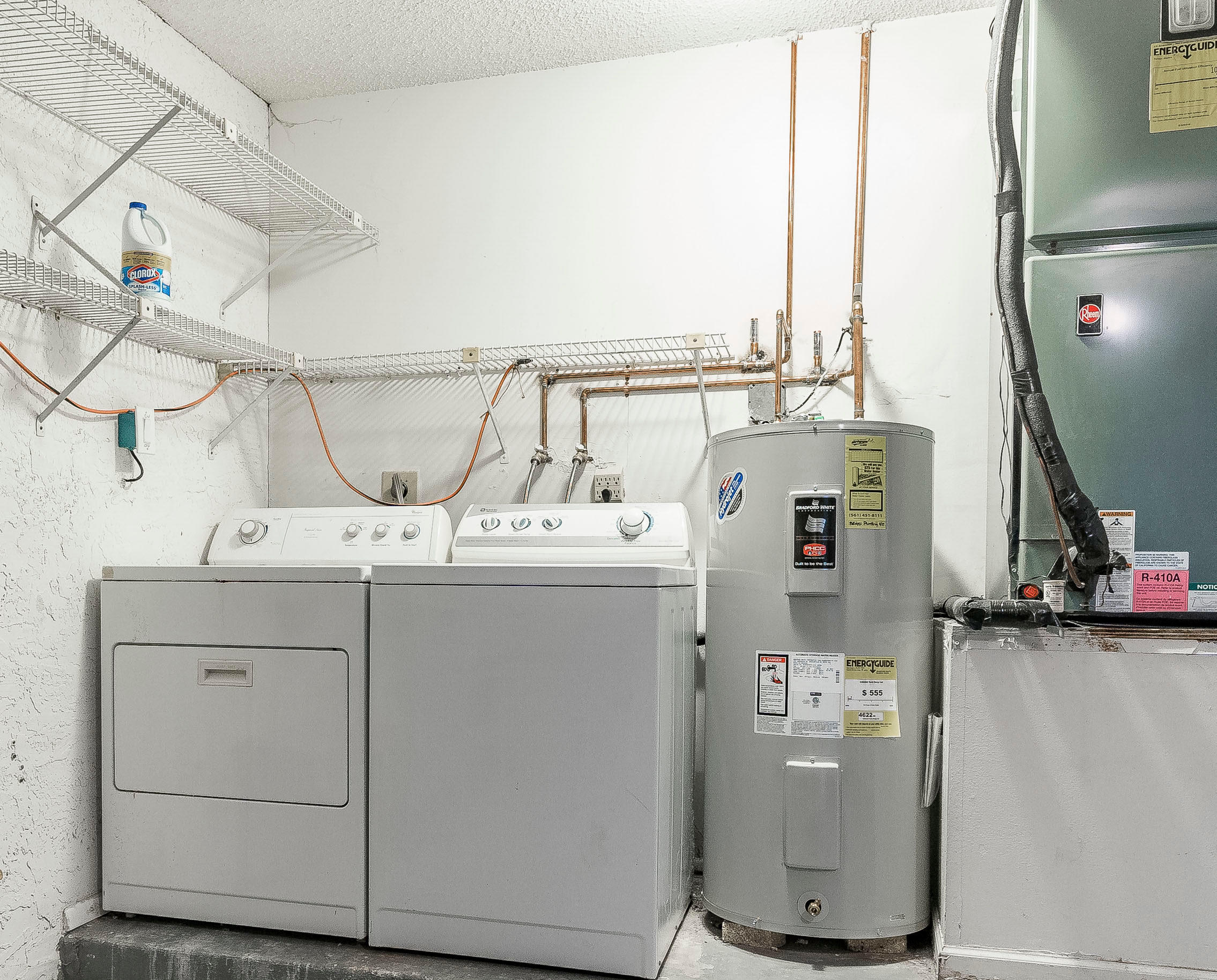 7723 Solimar Circle Boca Raton, FL 33433 - Photo 29 of 40 a utility room with dryer and washer