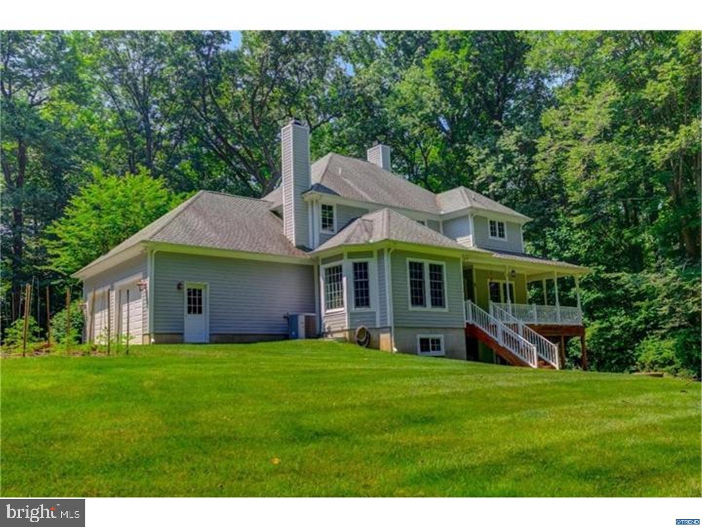 835 Pennock Bridge Road Landenberg, PA 19350 - Photo 2 of 25 a big house with a big yard and large trees