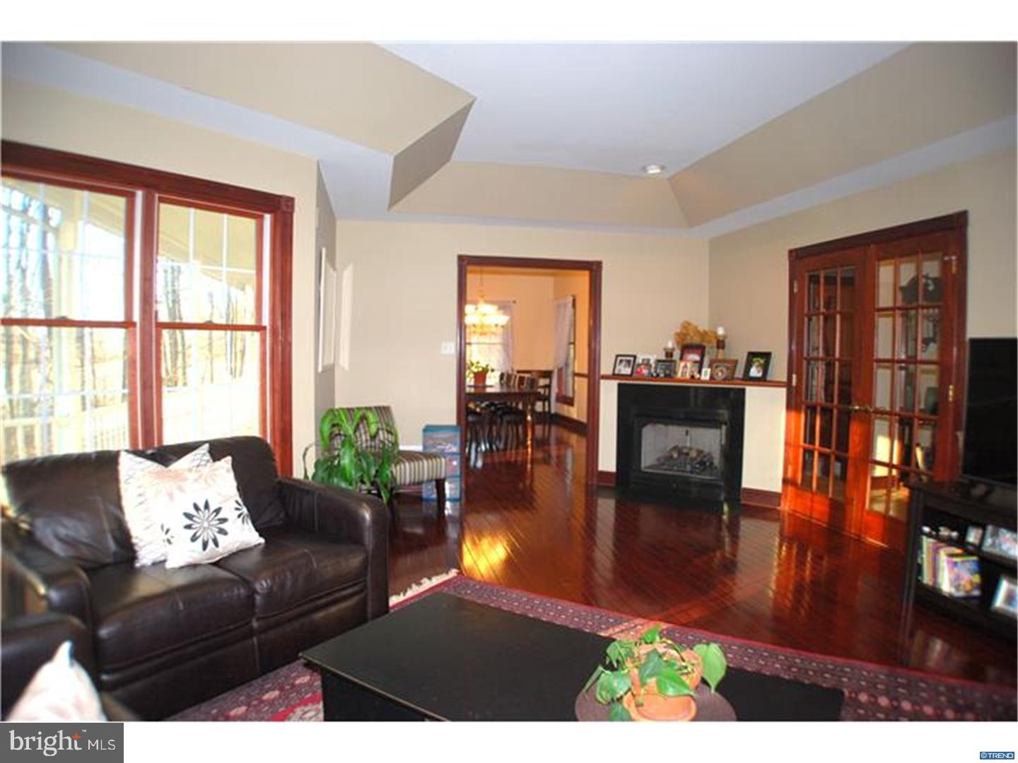 835 Pennock Bridge Road Landenberg, PA 19350 - Photo 12 of 25 a living room with furniture and a wooden floor