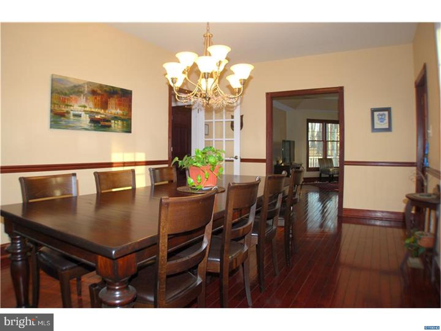 835 Pennock Bridge Road Landenberg, PA 19350 - Photo 13 of 25 a view of a dining room with furniture and wooden floor