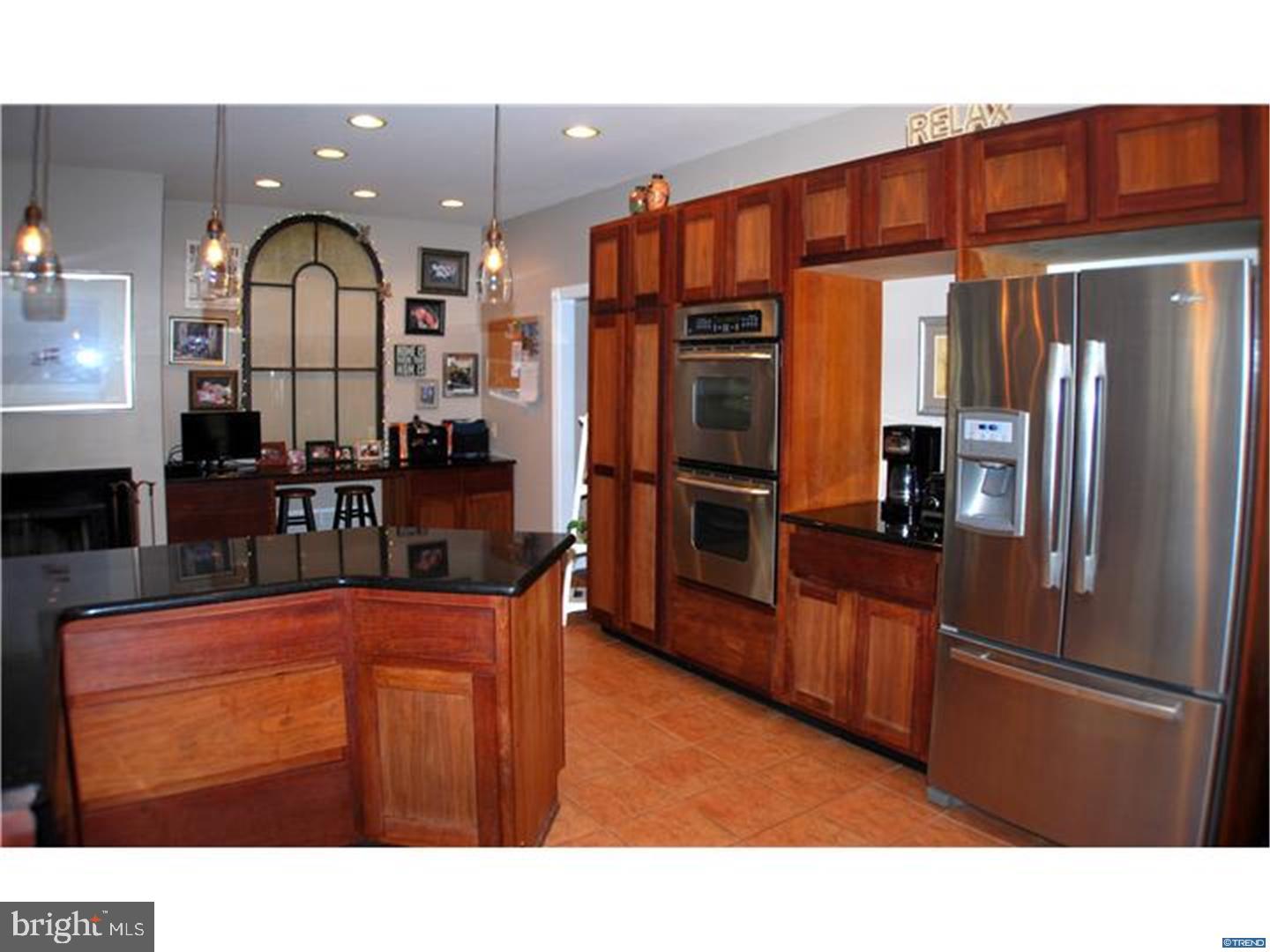 835 Pennock Bridge Road Landenberg, PA 19350 - Photo 16 of 25 a kitchen with stainless steel appliances granite countertop a refrigerator and a sink