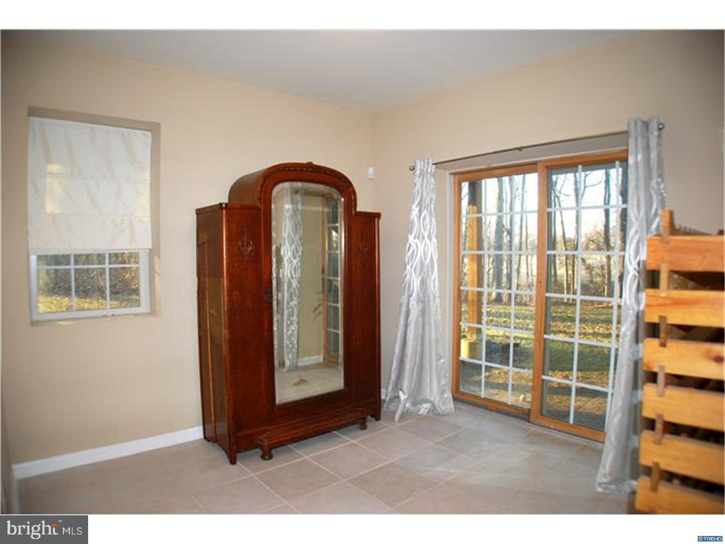 835 Pennock Bridge Road Landenberg, PA 19350 - Photo 19 of 25 a view of front door with wooden floor
