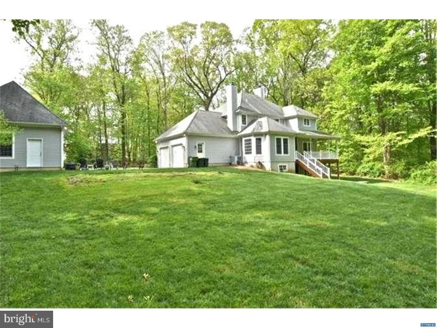 835 Pennock Bridge Road Landenberg, PA 19350 - Photo 3 of 25 a front view of a house with a garden