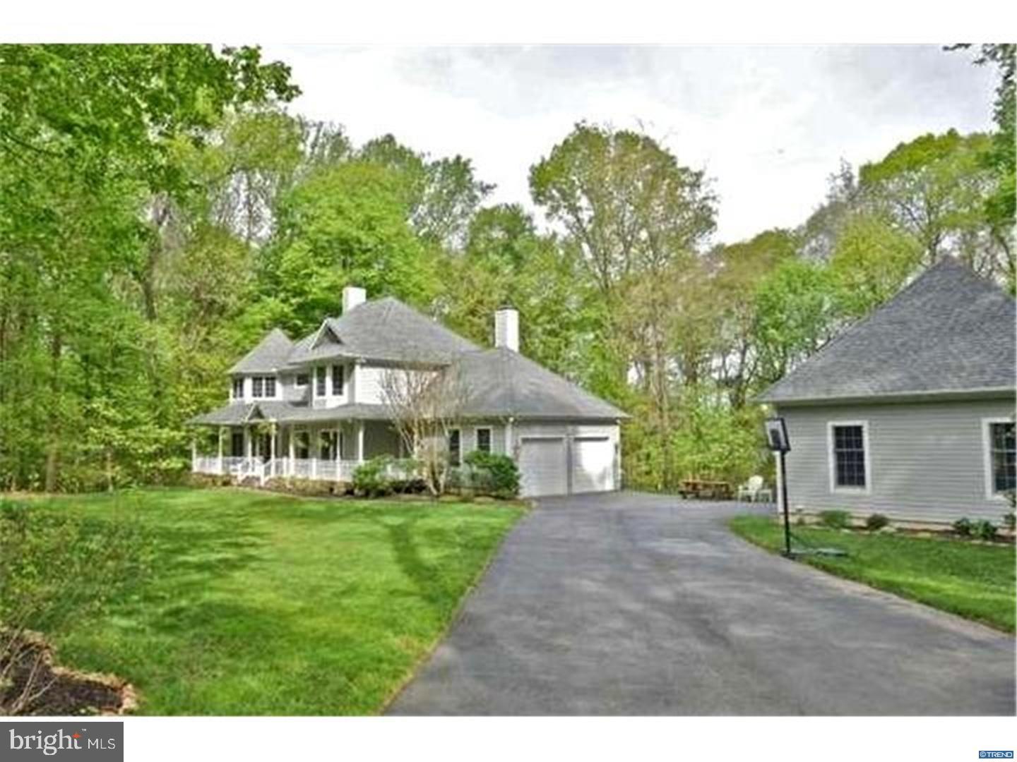 835 Pennock Bridge Road Landenberg, PA 19350 - Photo 4 of 25 a front view of a house with a yard
