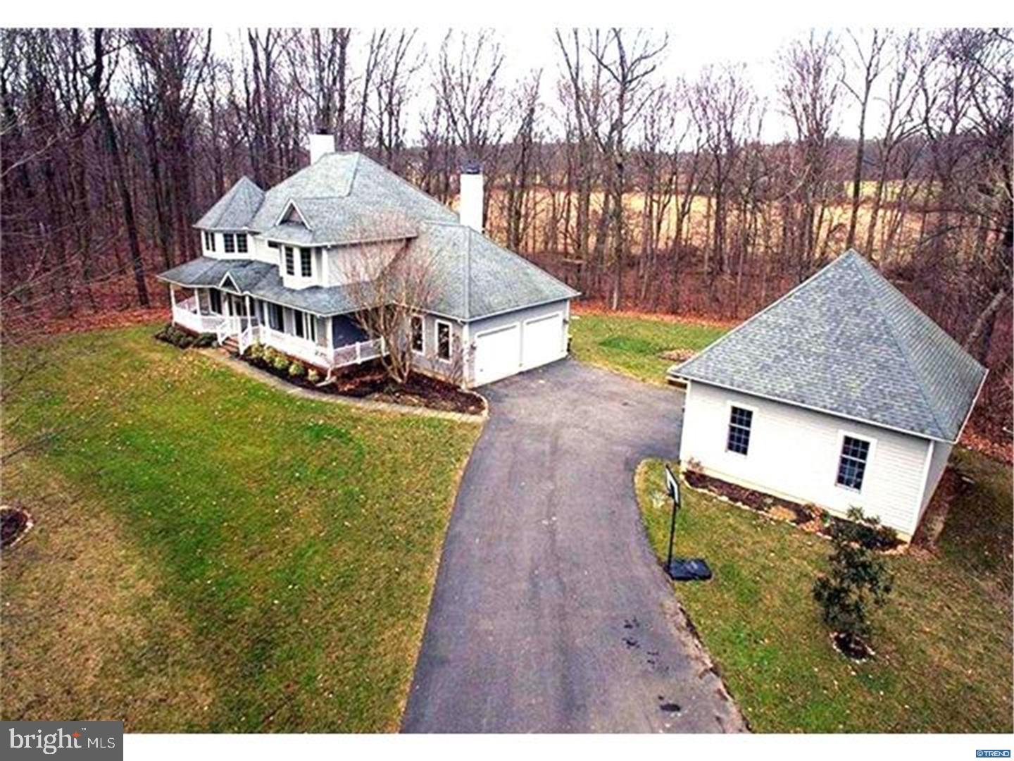 835 Pennock Bridge Road Landenberg, PA 19350 - Photo 8 of 25 a house with green field in front of it