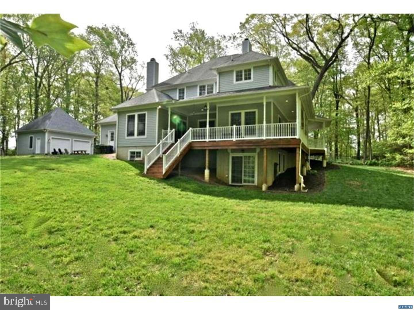 835 Pennock Bridge Road Landenberg, PA 19350 - Photo 9 of 25 a front view of a house with a garden