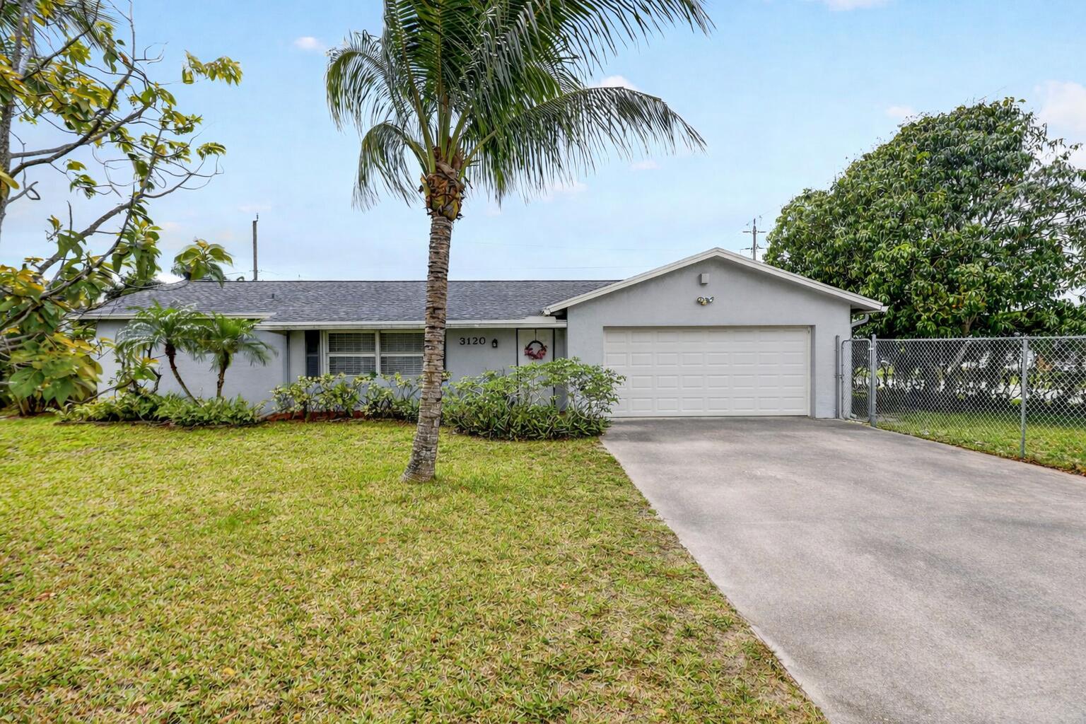 3120 Seagrape Road Lake Worth, FL 33462 - Photo 5 of 48 IMG_1956