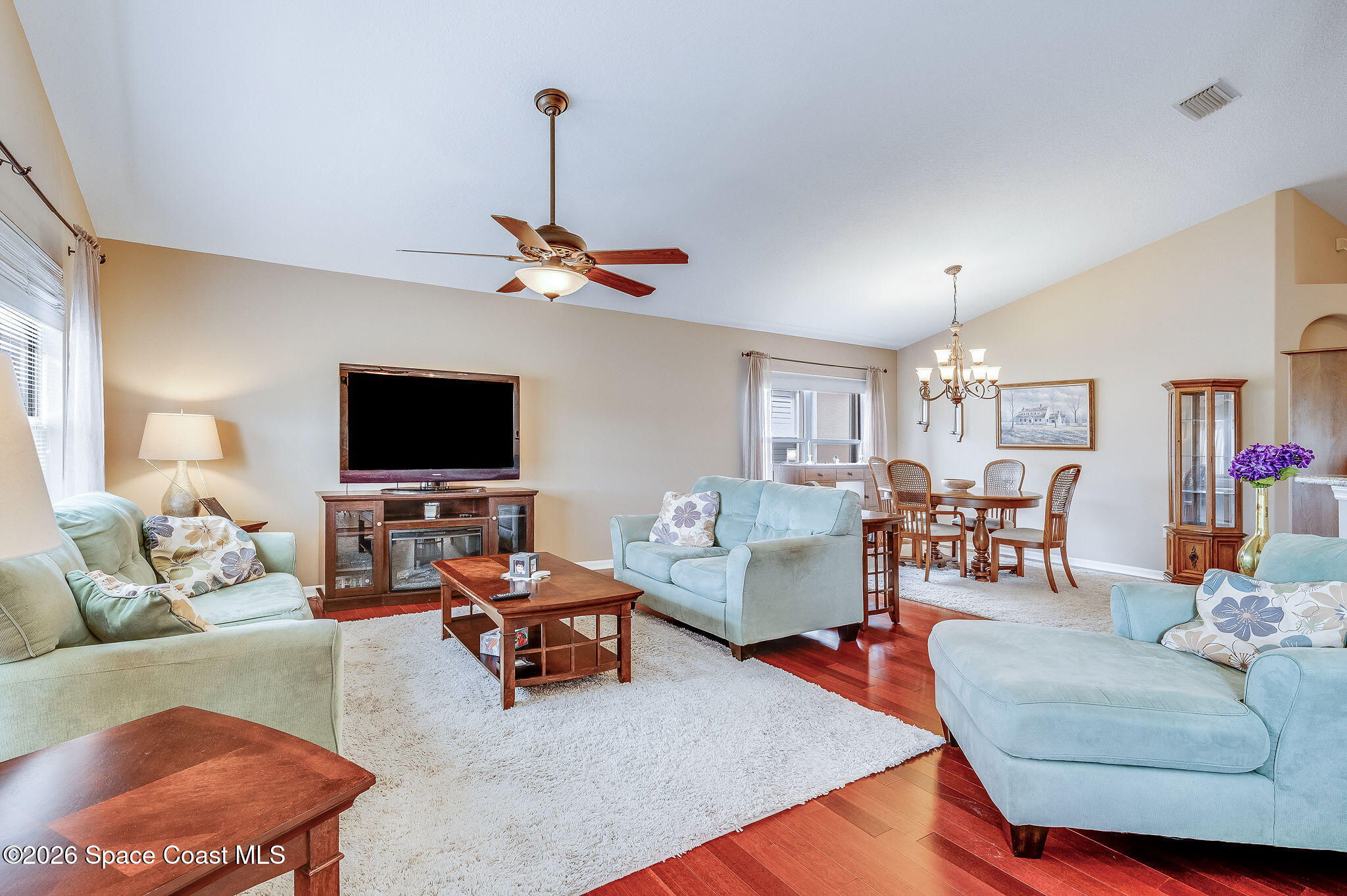 4910 Worthington Circle Rockledge, FL 32955 - Photo 21 of 69 a living room with furniture and a flat screen tv