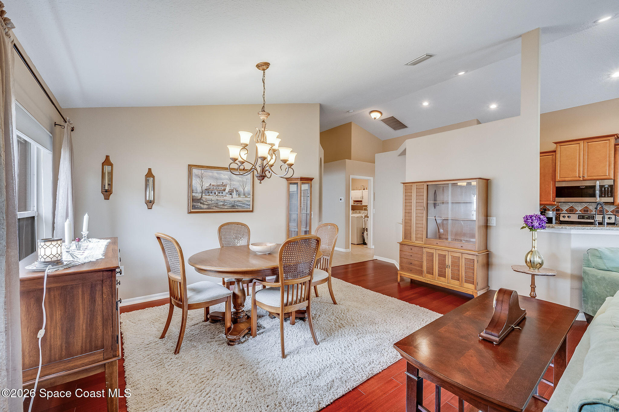 4910 Worthington Circle Rockledge, FL 32955 - Photo 26 of 69 a view of a dining room with furniture and chandelier