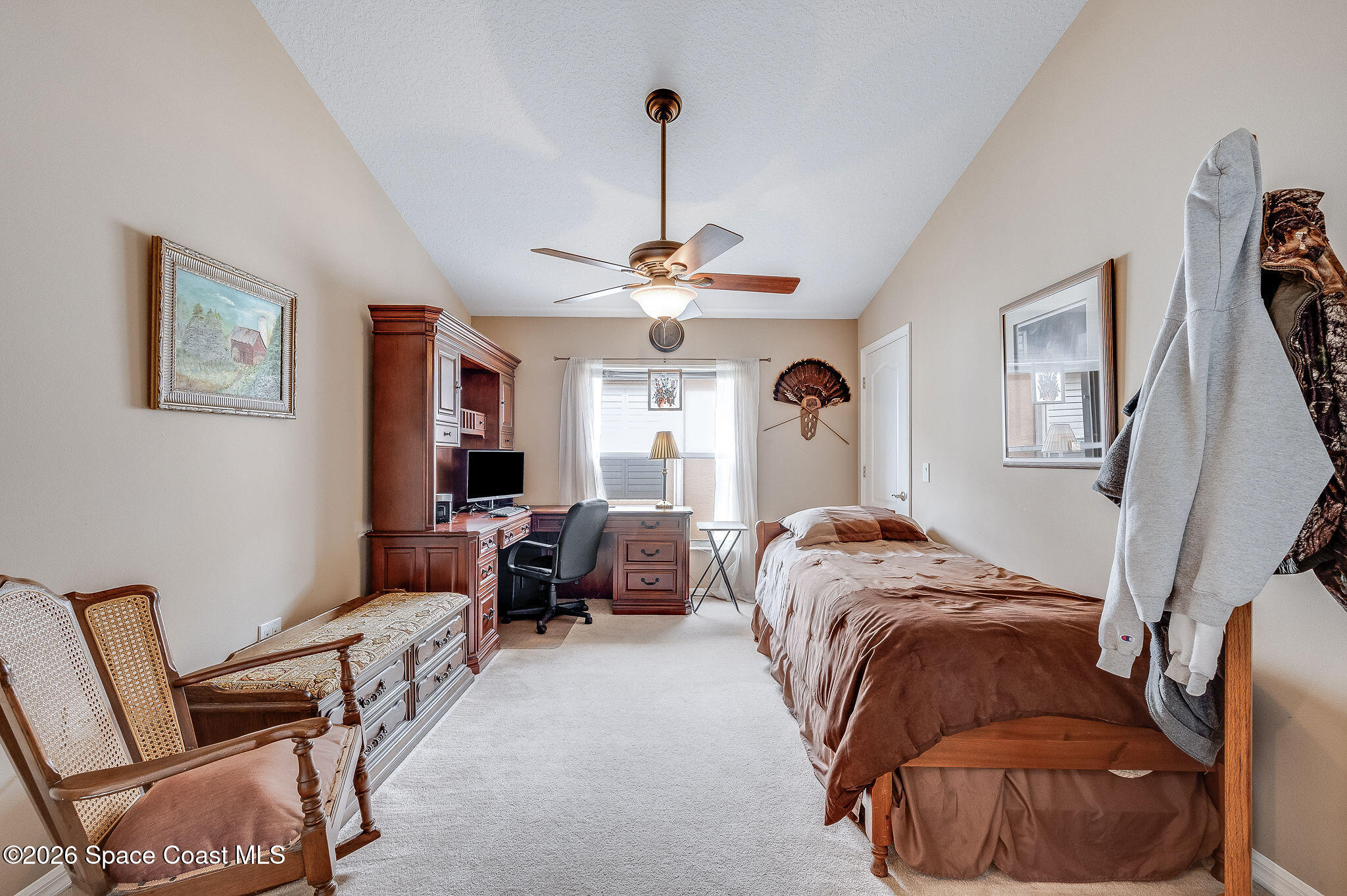 4910 Worthington Circle Rockledge, FL 32955 - Photo 37 of 69 a bedroom with bed and a window