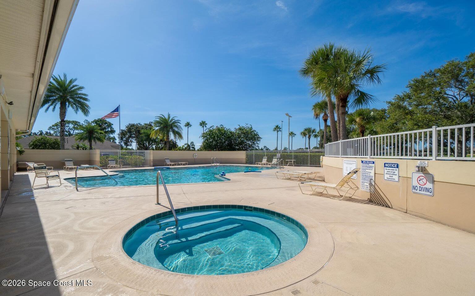 4910 Worthington Circle Rockledge, FL 32955 - Photo 67 of 69 swimming pool view with a seating space