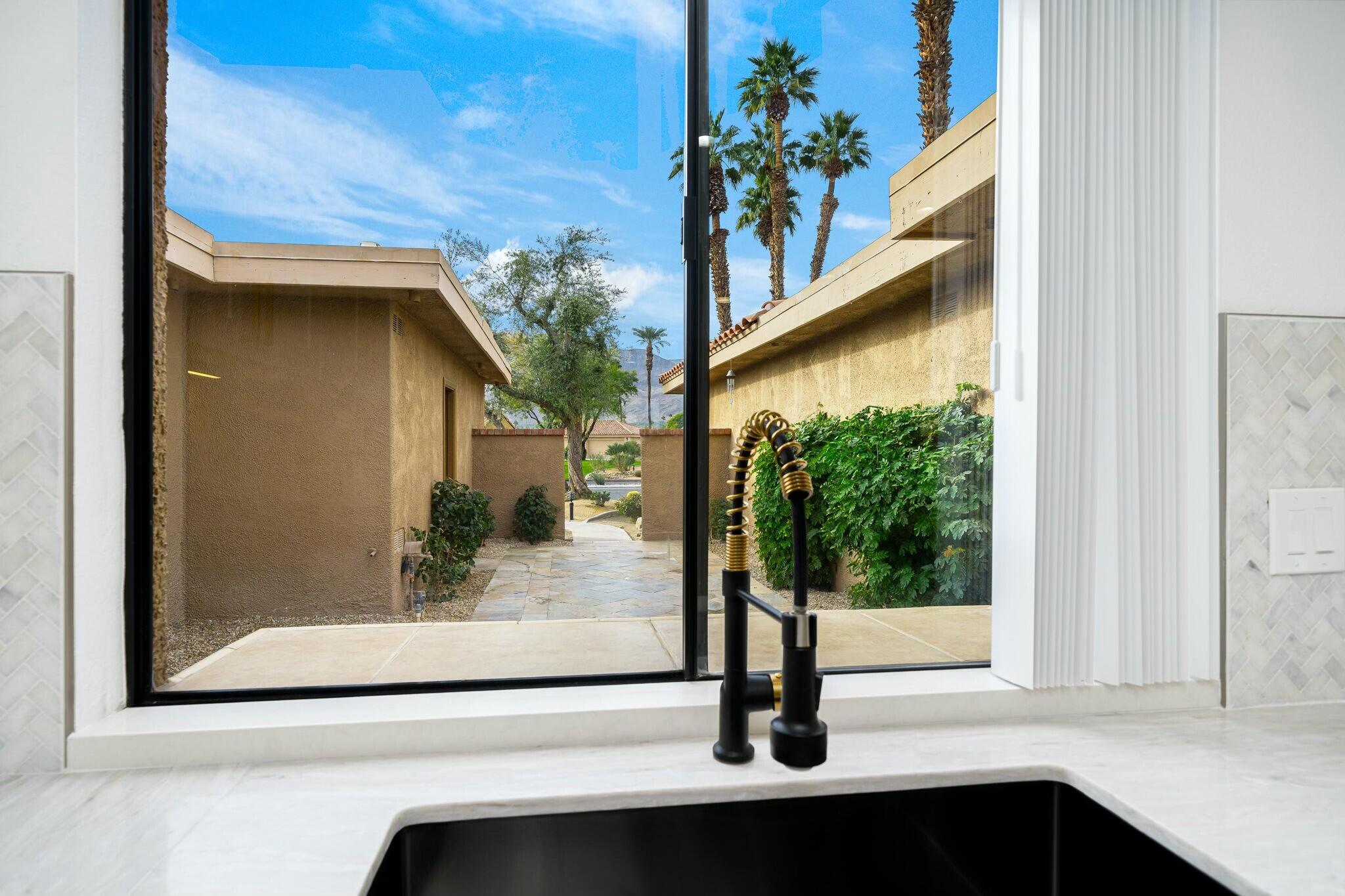 75 Sunrise Drive Rancho Mirage, CA 92270 - Photo 4 of 40 a view of a window in a house