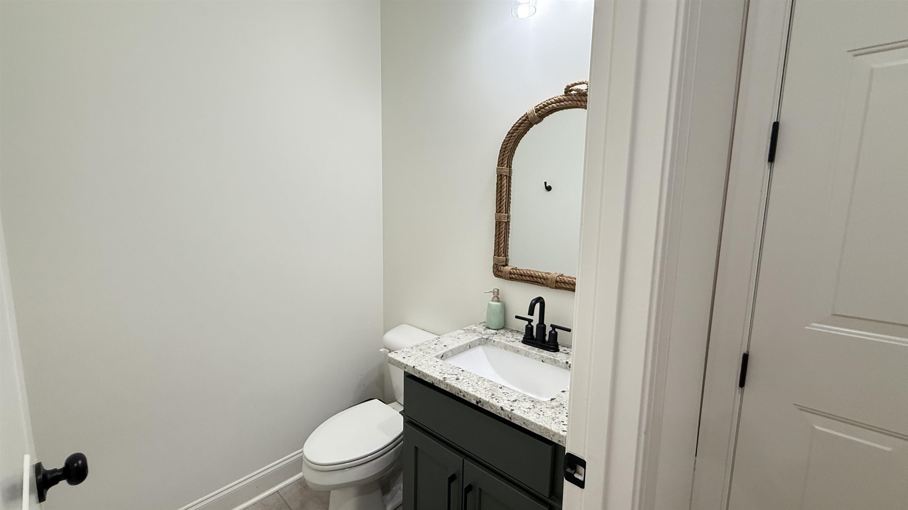 1746 Chadwick Farms Loop North Collierville, TN 38017 - Photo 19 of 35 Bathroom featuring vanity and toilet