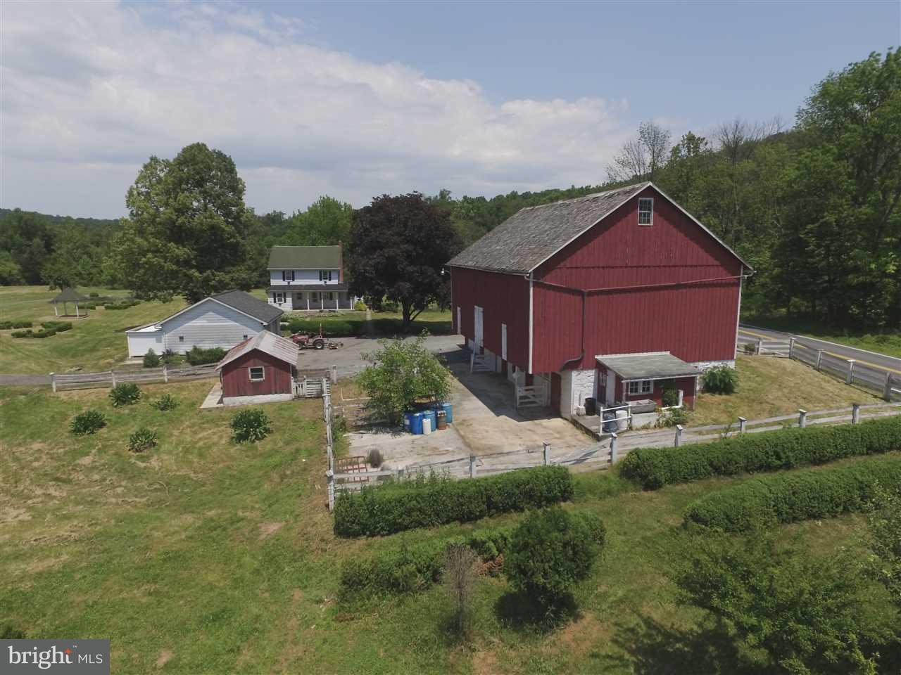 1692 Schoolhouse Road Middletown, PA 17057 - Photo 36 of 90 Barn with Road to Right and Farmhouse at Rear