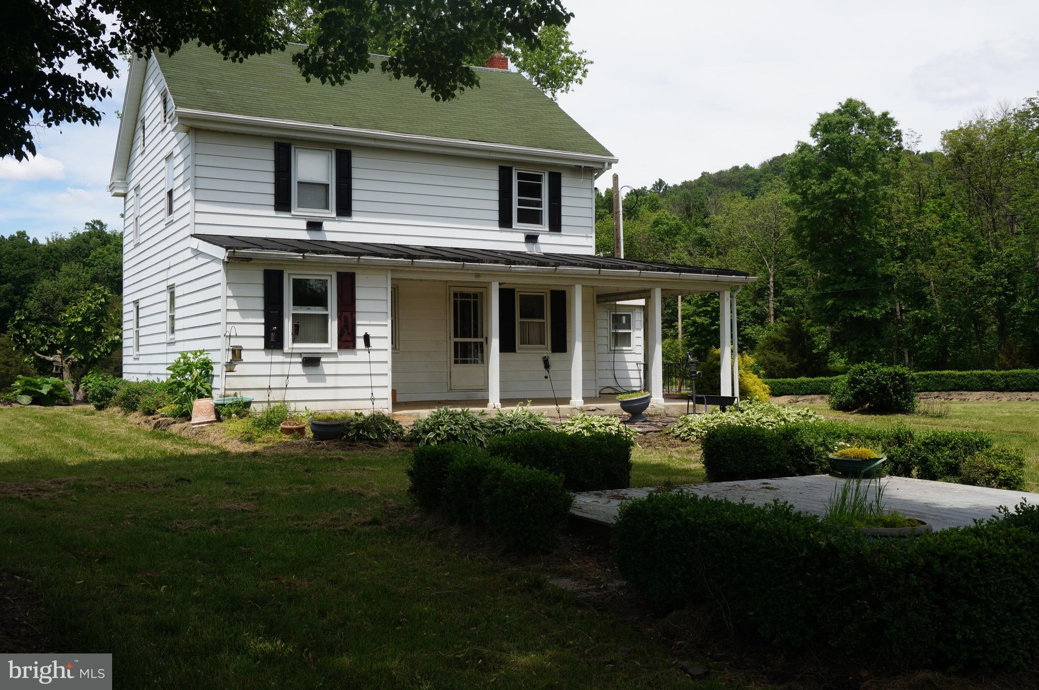 1692 Schoolhouse Road Middletown, PA 17057 - Photo 40 of 90 Front of Farmhouse with Open Deck in Foreground