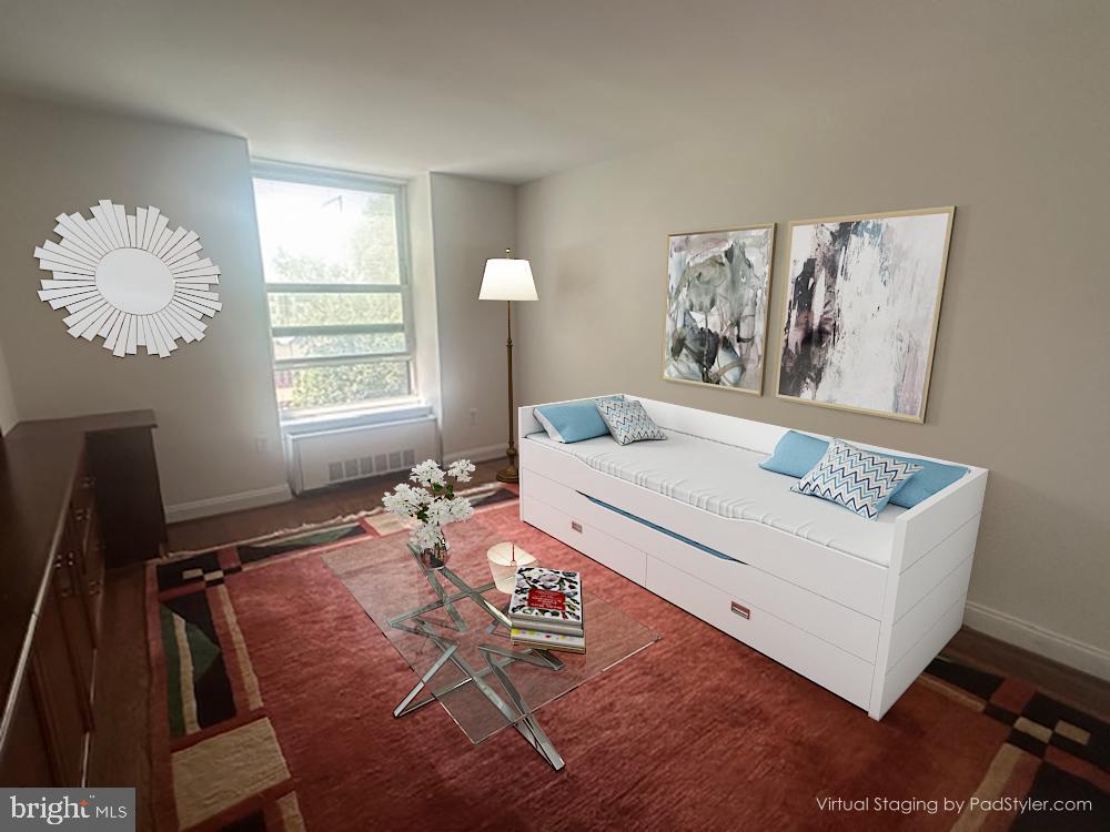 41 Conshohocken State Road, Unit 510 Bala Cynwyd, PA 19004 - Photo 19 of 32 a bedroom with a bed and a window
