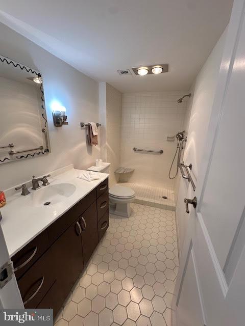 41 Conshohocken State Road, Unit 510 Bala Cynwyd, PA 19004 - Photo 21 of 32 a bathroom with a double vanity sink mirror and toilet