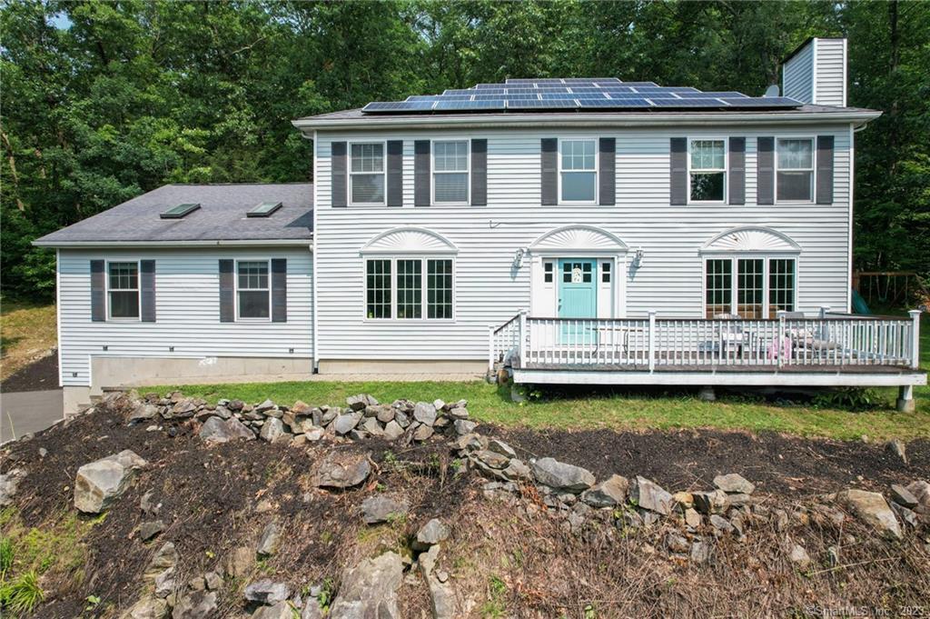 35 Ave D Beacon Falls, CT 06403 - Photo 1 of 1 a front view of a house with a garden and swimming pool