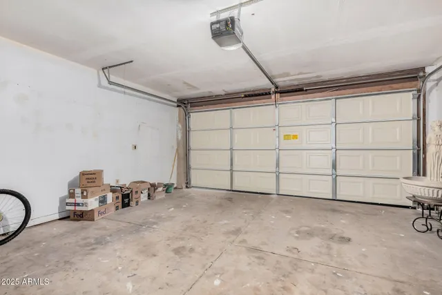 a view of a livingroom with storage and utility room