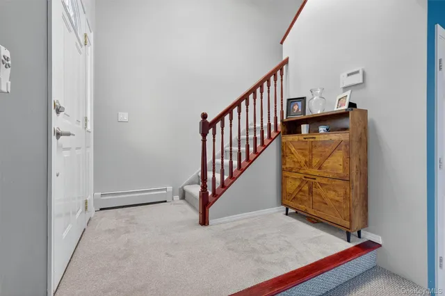 a view of an entryway with staircase