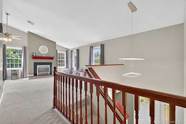 a view of livingroom with furniture and fireplace