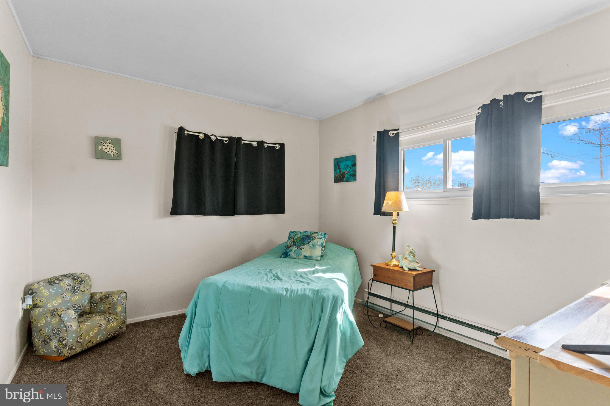 56 Old Pond Road Levittown, PA 19057 - Photo 14 of 20 a bedroom with a bed and window