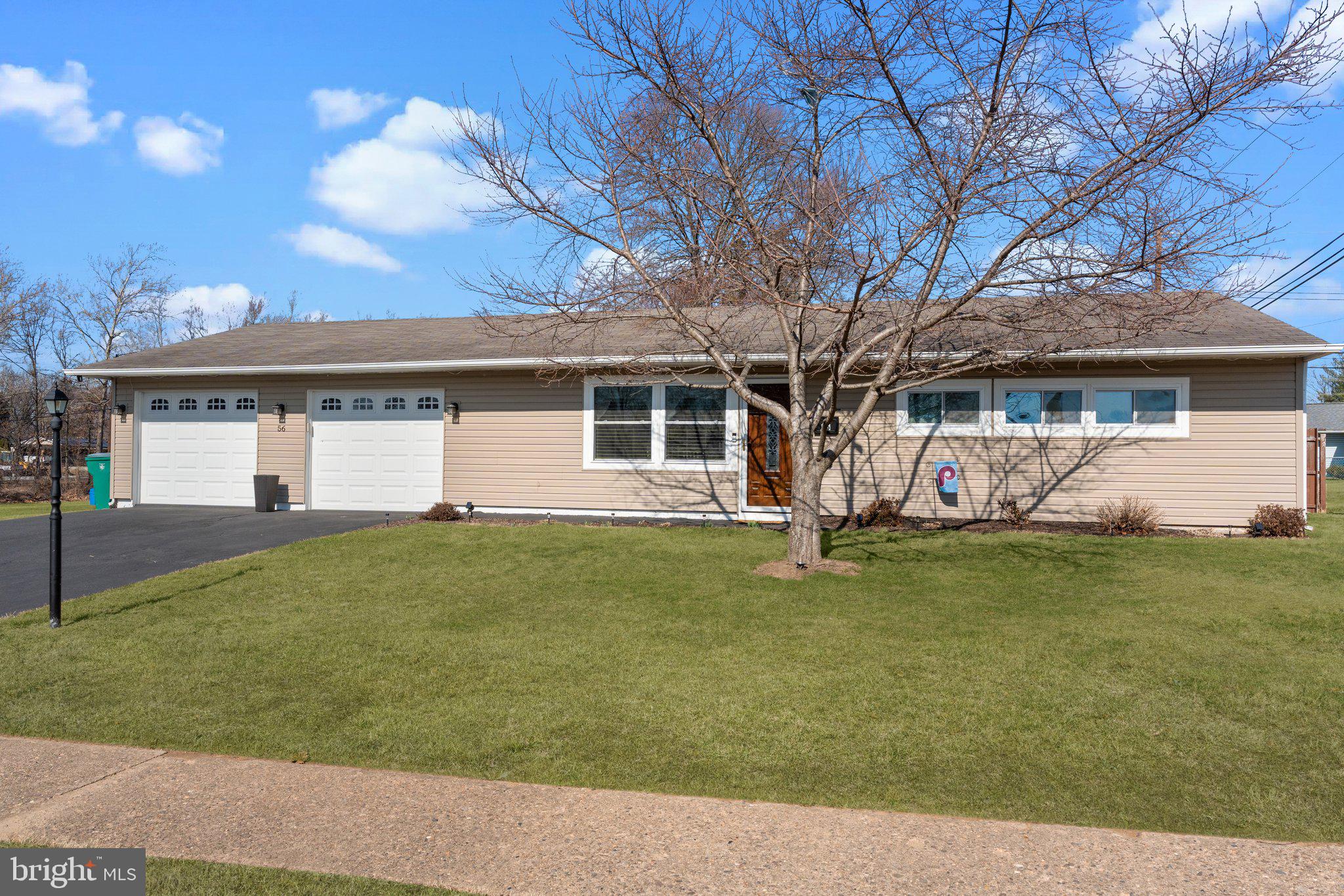 56 Old Pond Road Levittown, PA 19057 - Photo 2 of 20 a view of a house with a backyard