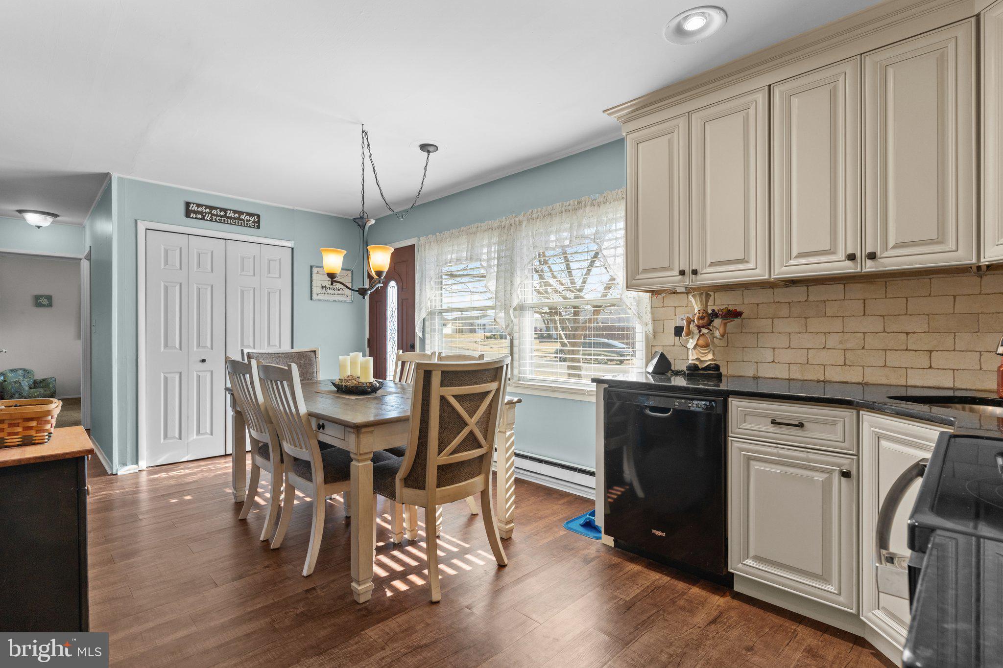 56 Old Pond Road Levittown, PA 19057 - Photo 5 of 20 a view of a dining room with furniture window and wooden floor
