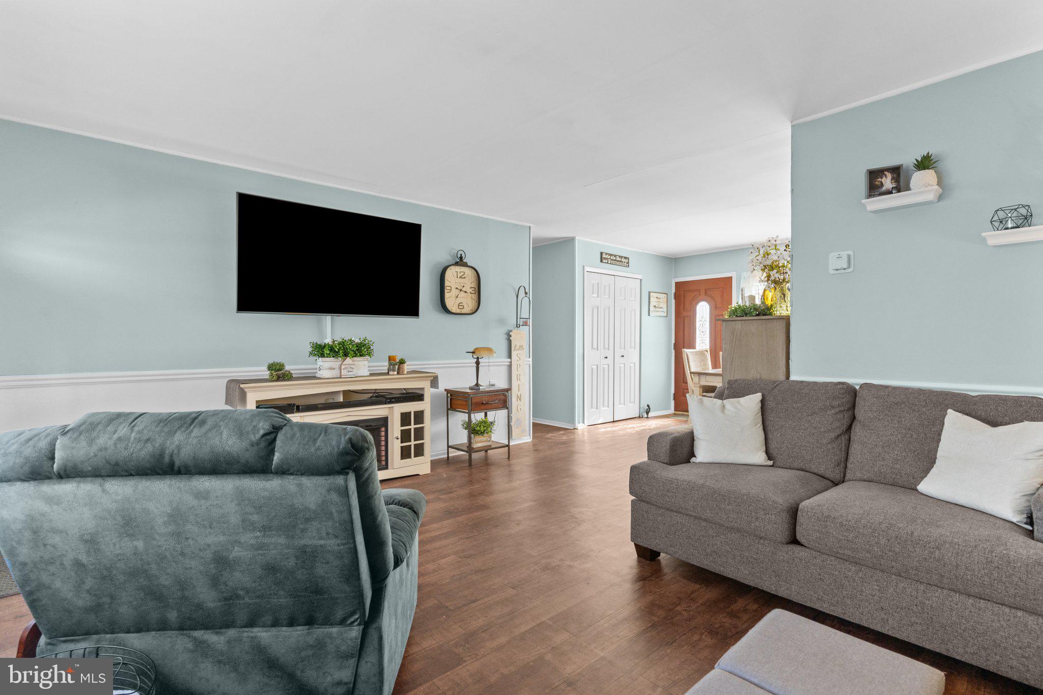 56 Old Pond Road Levittown, PA 19057 - Photo 9 of 20 a living room with furniture and a flat screen tv