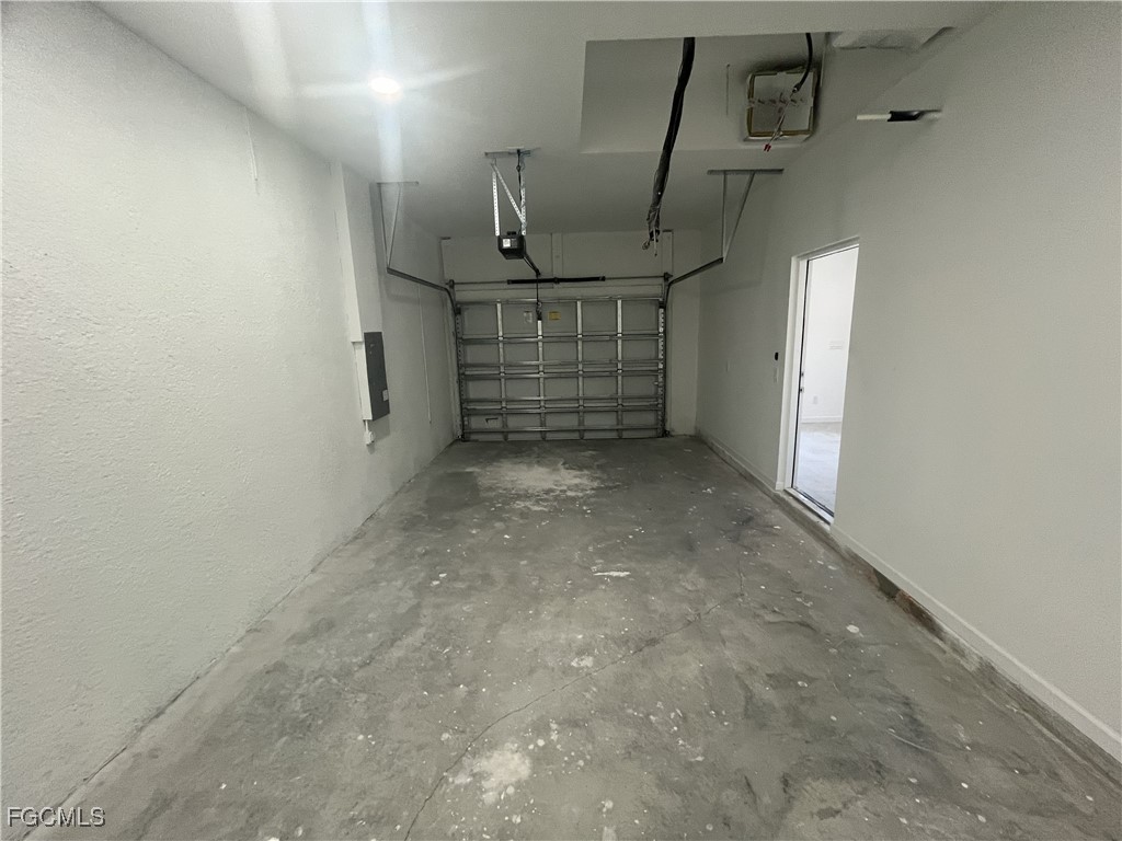 3307 50th Street West Lehigh Acres, FL 33971 - Photo 12 of 15 a view of empty room with wooden floor