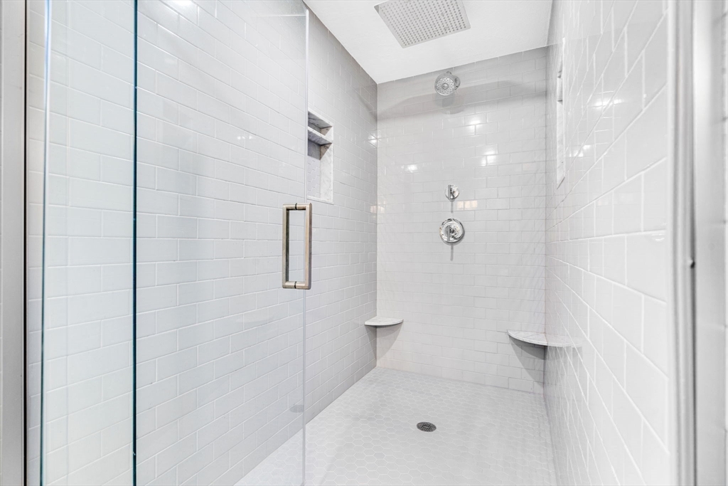 3 Erin Lane Norfolk, MA 02056 - Photo 29 of 37 a bathroom with a shower