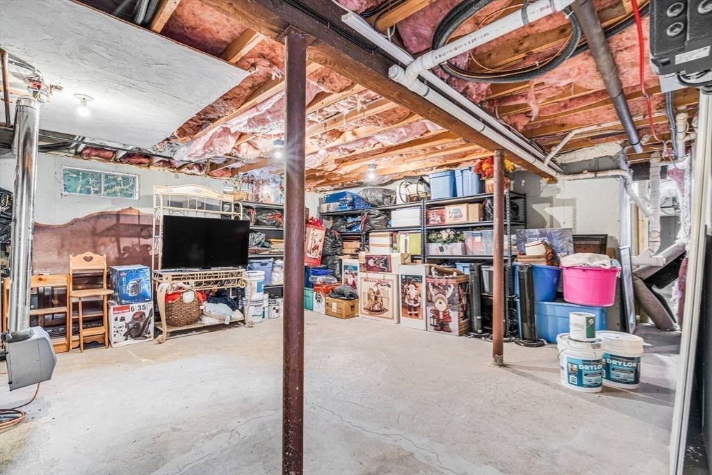 3 Erin Lane Norfolk, MA 02056 - Photo 34 of 37 a view of living room with furniture and a flat screen tv