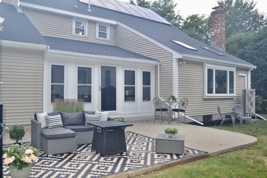 3 Erin Lane Norfolk, MA 02056 - Photo 36 of 37 a view of a house with backyard and sitting area