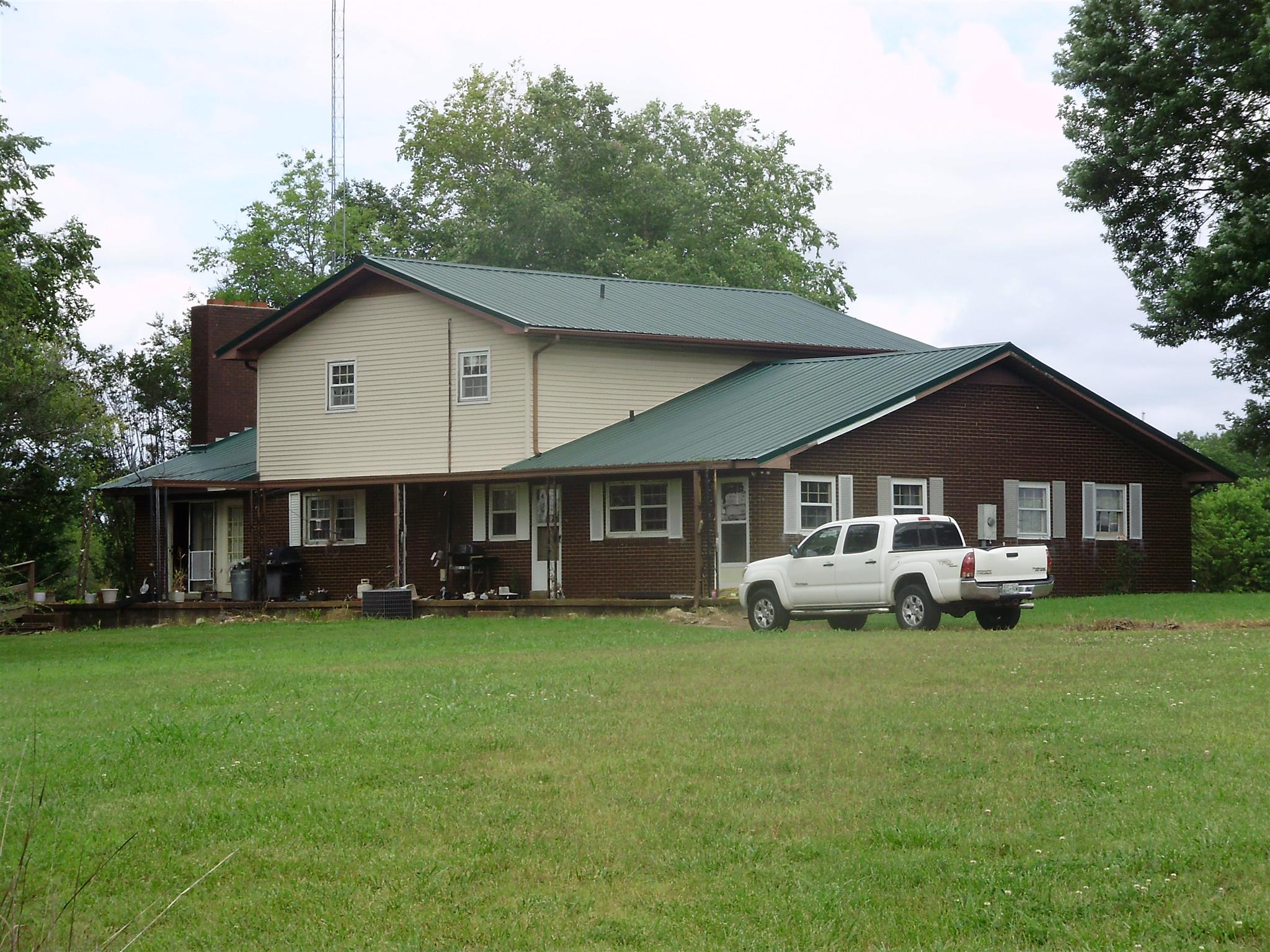 51 Ramah Road Leoma, TN 38468 - Photo 8 of 30 a view of a house with a yard and sitting area