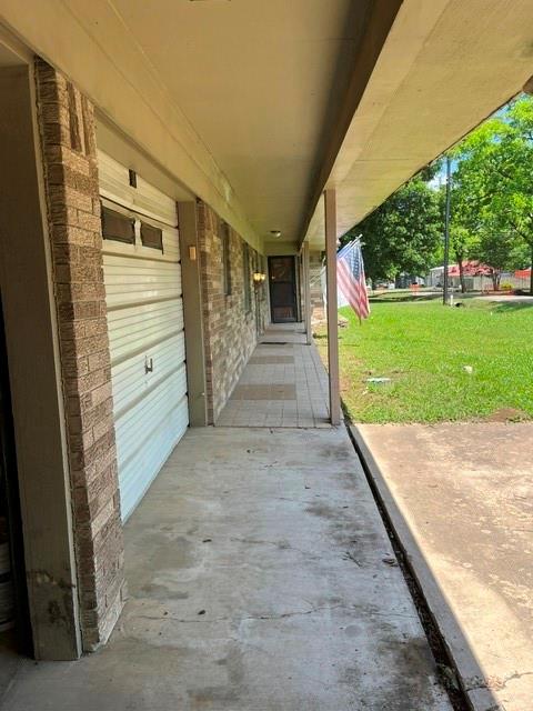 304 Sunset Street Roxton, TX 75477 - Photo 2 of 31 a view of a porch