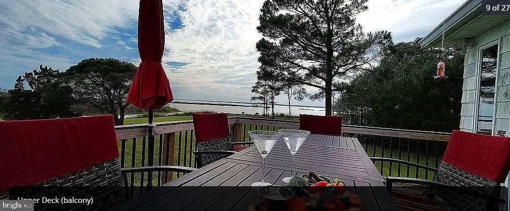 3310 Belfiore Road Church Creek, MD 21622 - Photo 14 of 55 a view of balcony with wooden floor and outdoor seating