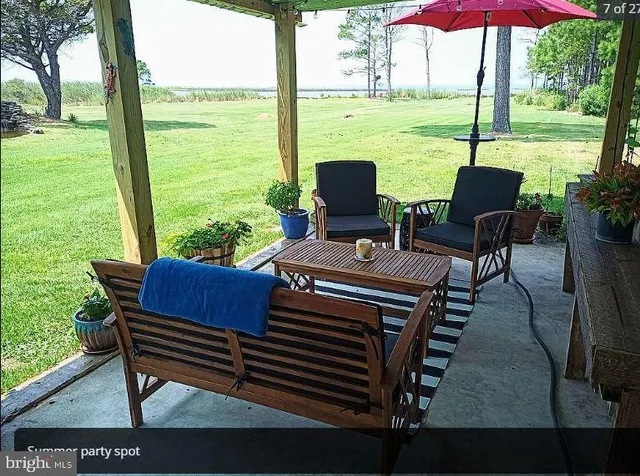 a view of a room with workspace and mirror